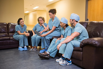 Image showing Medical Team Using Digital Tablet In Hospital's Waiting Room