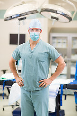 Image showing Male Doctor With Hands On Hips In Operation Room