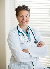 Image showing Confident Cancer Specialist With Arms Crossed In Clinic