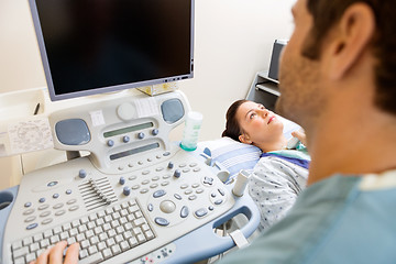 Image showing Nurse Performing Ultrasound Procedure