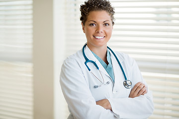 Image showing Confident Cancer Specialist Standing Arms Crossed In Clinic