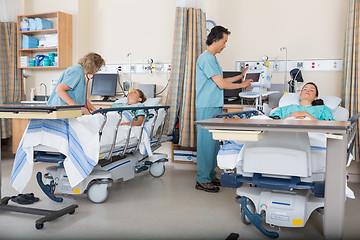 Image showing Nurses Caring for Patients in PACU