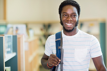 Image showing Student Looking Away In Bookstore