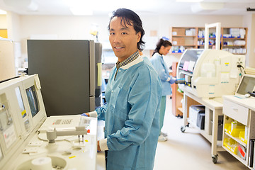 Image showing Male Scientist Working In Laboratory