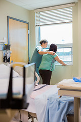 Image showing Nurse Consoling Pregnant Woman Having Contraction