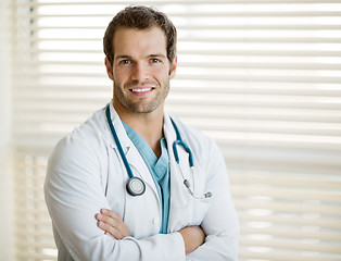 Image showing Confident Male Doctor With Arms Crossed