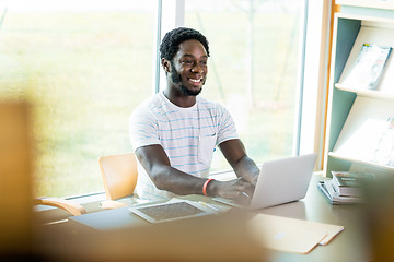 Image showing Student Using Laptop While Studying In Library
