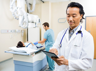 Image showing Medical Team With Patient In Examination Room