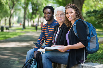 Image showing Multiethnic University Students Sitting On Campus