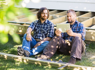 Image showing Manual Workers Using Digital Tablet