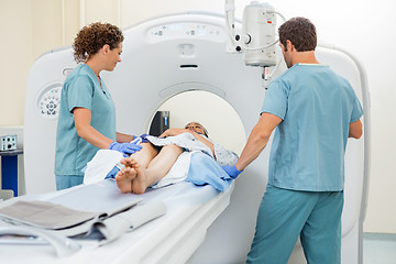 Image showing Nurses Preparing Patient For CT Scan