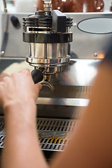 Image showing Barista With Portafilter Making Coffee