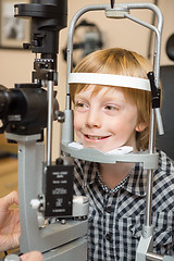 Image showing Boy Undergoing Eye Examination Test With Slit Lamp