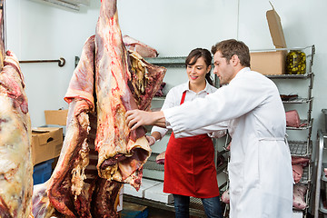 Image showing Butchers Inspecting Beef