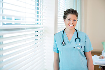 Image showing Confident Female Nurse With Stethoscope Around Neck