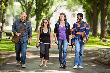 Image showing Multiethnic University Students Walking On Campus