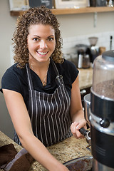 Image showing Barista Preparing Coffee In Cafe