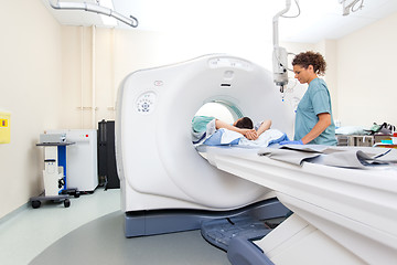 Image showing Nurse Preparing Patient For CT Scan Test