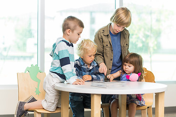 Image showing Students Using Tablet Computer In Library