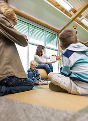 Image showing Teacher Showing Picture Book To Children