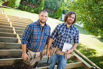 Image showing Construction Workers With Digital Tablet At Construction Site