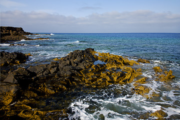 Image showing water  in lanzarote  isle foam   stone sky cloud beach  