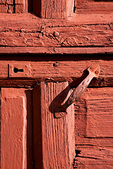 Image showing spain knocker  door wood in the red brown 