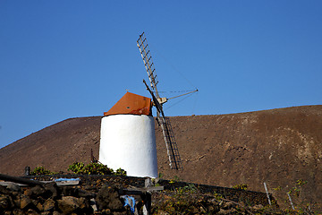 Image showing cactus windmills   isle of lanzarote spain   and sky 