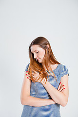 Image showing Attractive woman with folded arms