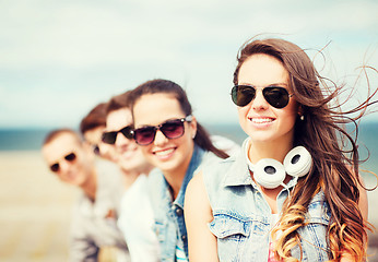 Image showing teenage girl with friends outside