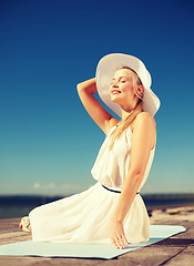 Image showing beautiful woman enjoying summer outdoors