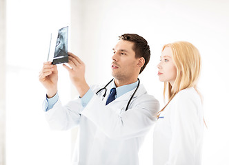 Image showing two doctors looking at x-ray