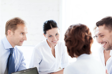 Image showing businesswoman with team on meeting in office