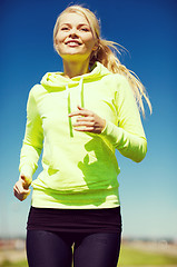 Image showing woman jogging outdoors