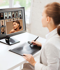Image showing female retoucher working at home or office
