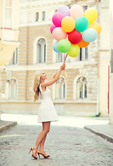 Image showing woman with colorful balloons