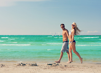 Image showing couple walking on the beach