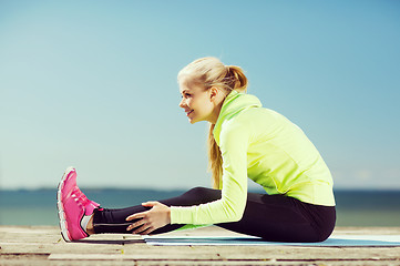 Image showing woman doing sports outdoors