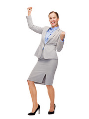 Image showing happy businesswoman with hands up