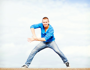 Image showing handsome boy making dance move