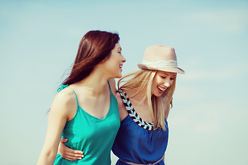 Image showing girls walking on the beach