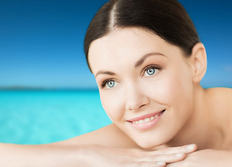 Image showing smiling woman on the beach