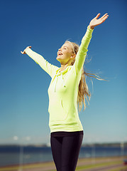 Image showing woman doing sports outdoors