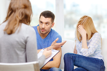 Image showing young couple with a problem at psychologist office