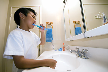 Image showing Brushing teeth