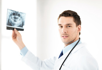 Image showing male doctor or dentist with x-ray