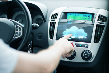 Image showing man using car control panel