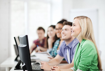 Image showing students with computers studying at school