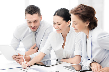 Image showing business team working with tablet pcs