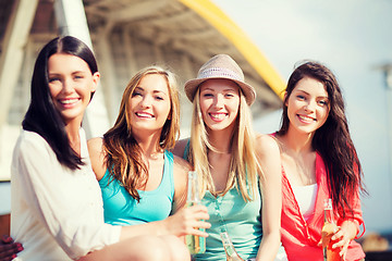 Image showing girls with drinks on the beach